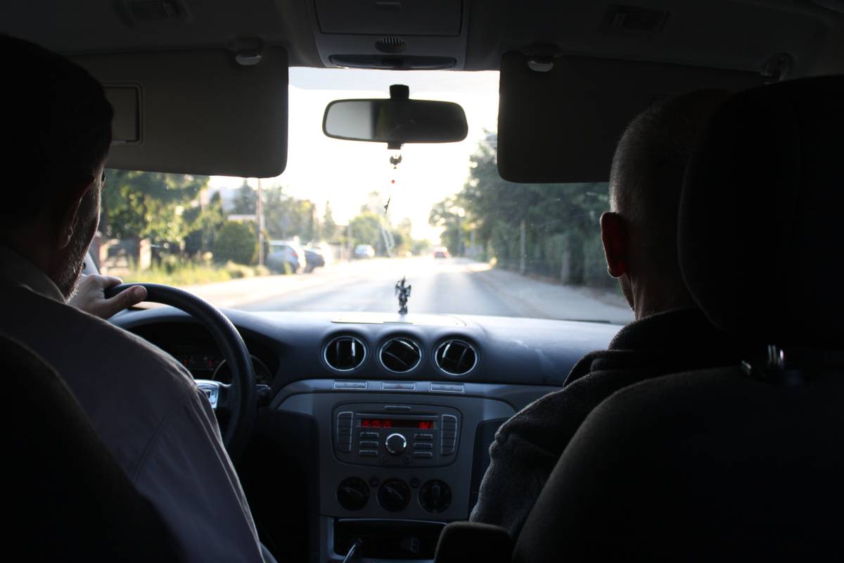 My father and his friend driving