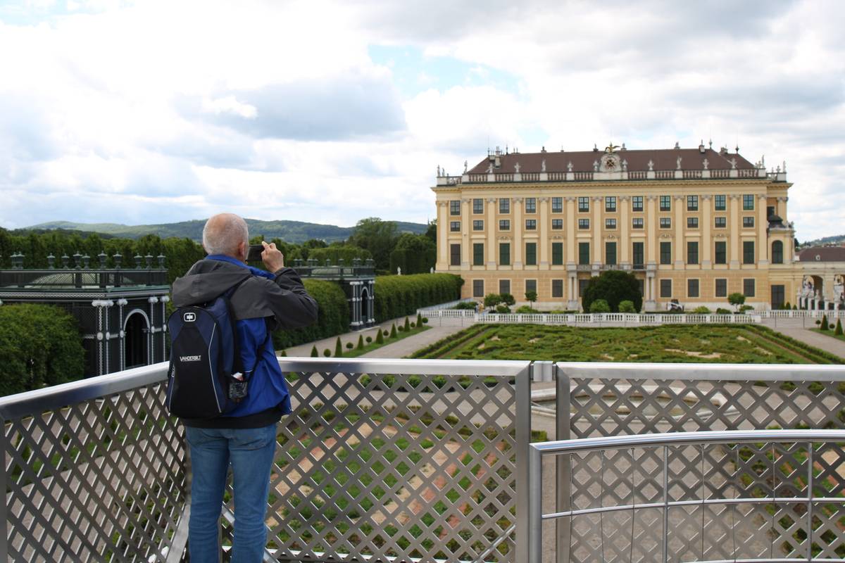 My dad takes a photo on the same platform