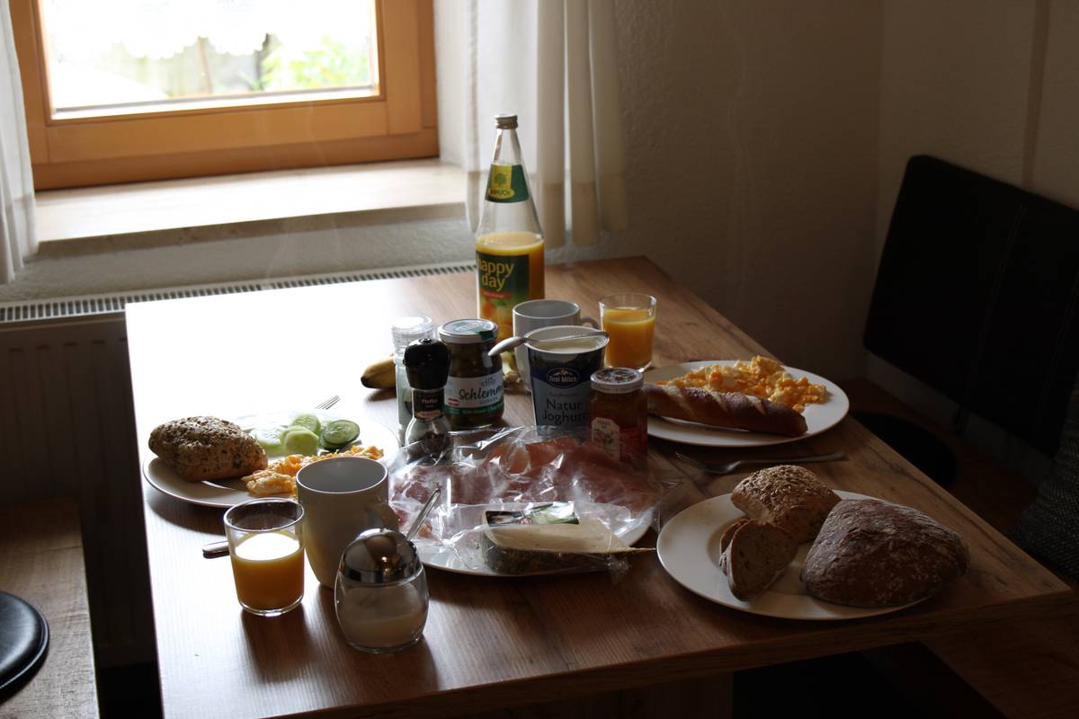 A breakfast table with food